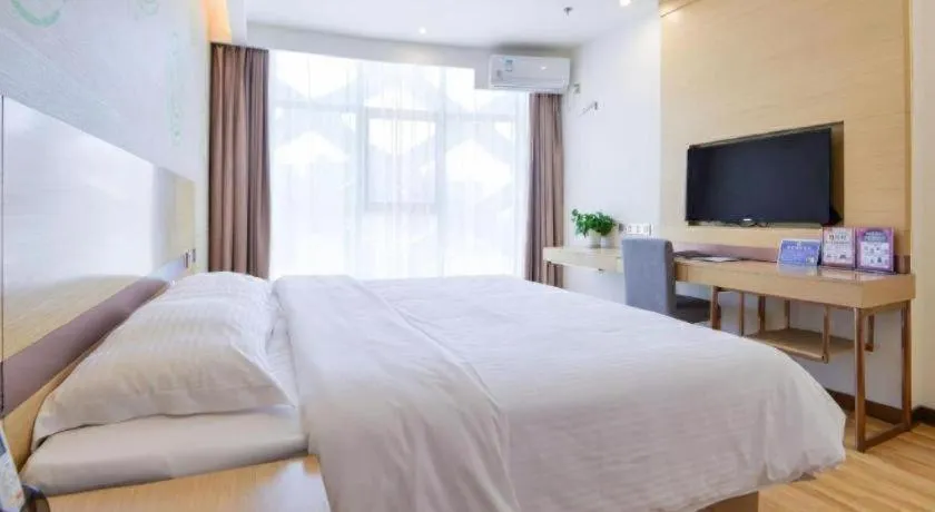 Bed in GreenTree Inn Nantong Zhangzhishan Town Deli Plaza Express Hotel