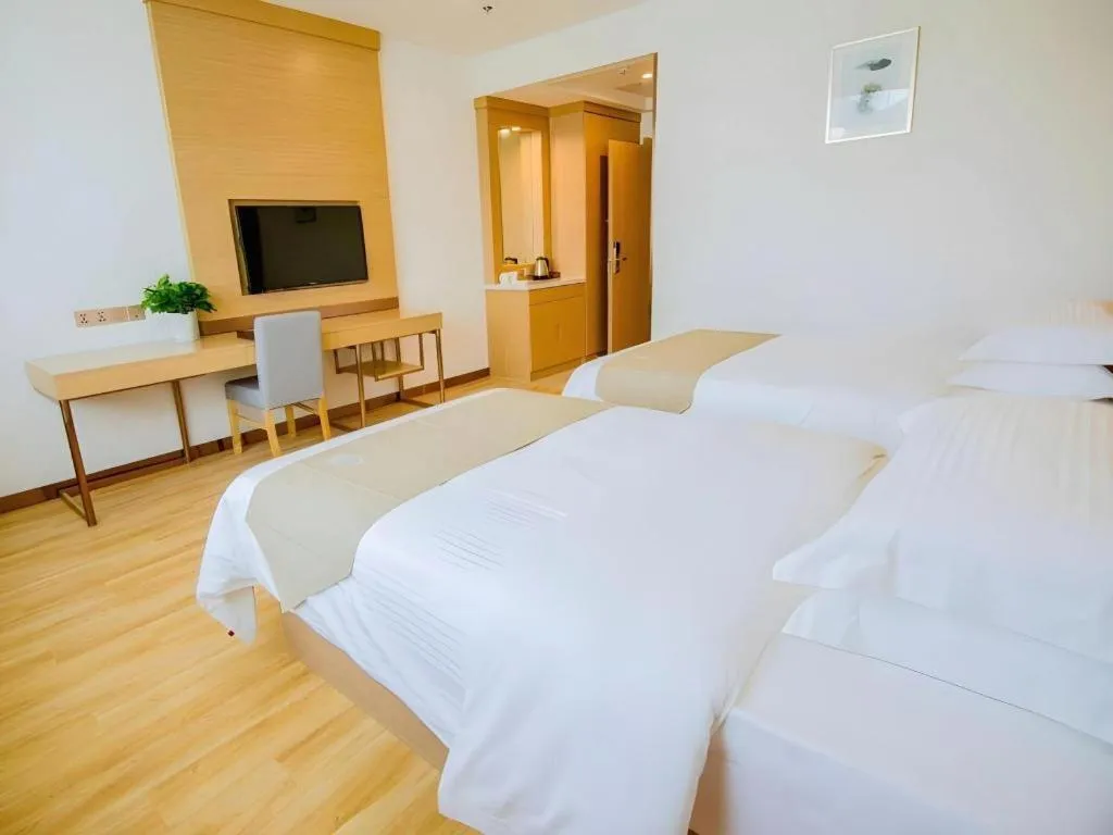 Bed in GreenTree Inn Nantong Zhangzhishan Town Deli Plaza Express Hotel