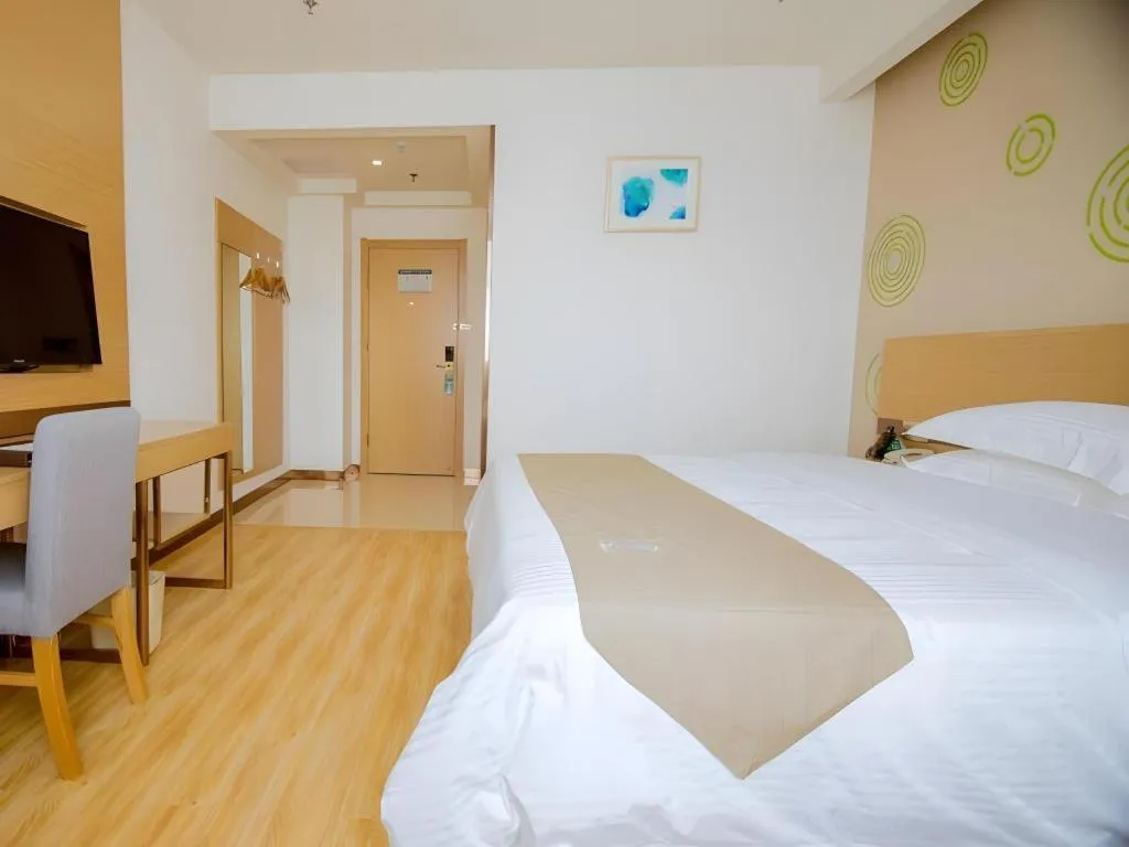Bed in GreenTree Inn Nantong Zhangzhishan Town Deli Plaza Express Hotel