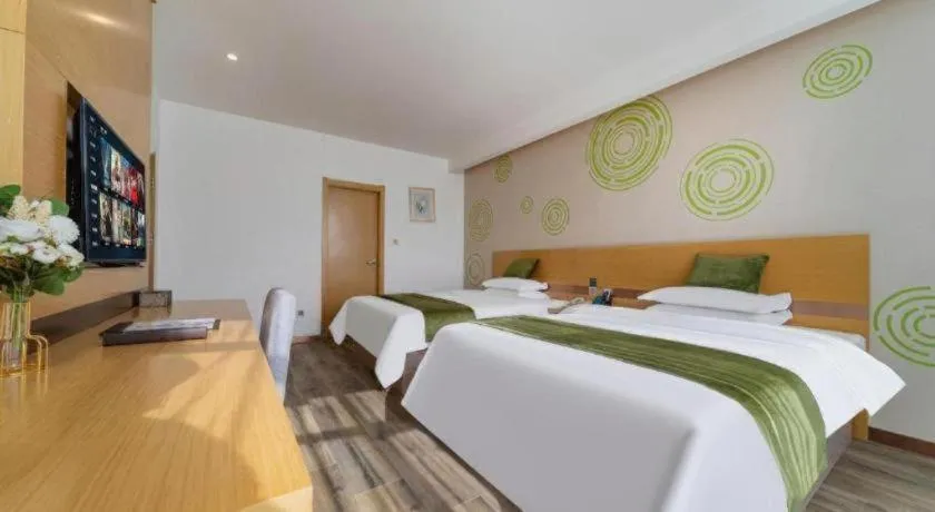 Bed in GreenTree Inn Nantong Zhangzhishan Town Deli Plaza Express Hotel