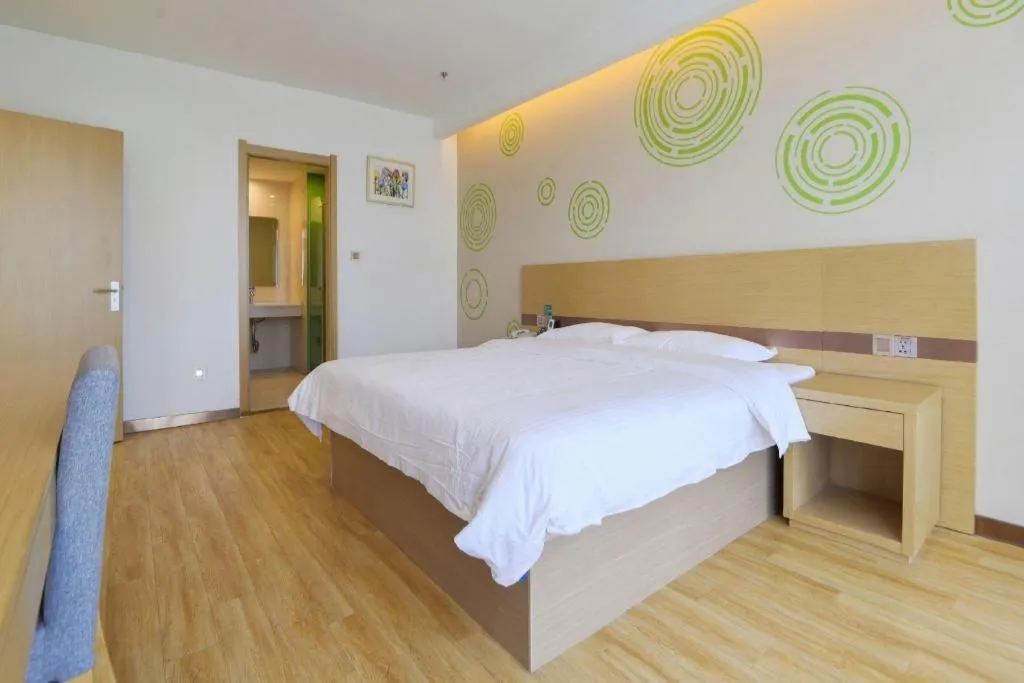 Bed in GreenTree Inn Nantong Zhangzhishan Town Deli Plaza Express Hotel