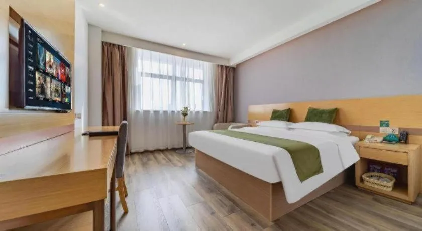 Bed in GreenTree Inn Nantong Zhangzhishan Town Deli Plaza Express Hotel