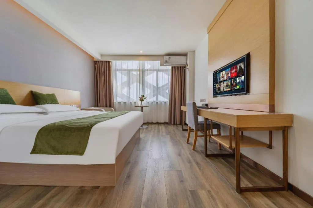Bed in GreenTree Inn Nantong Zhangzhishan Town Deli Plaza Express Hotel