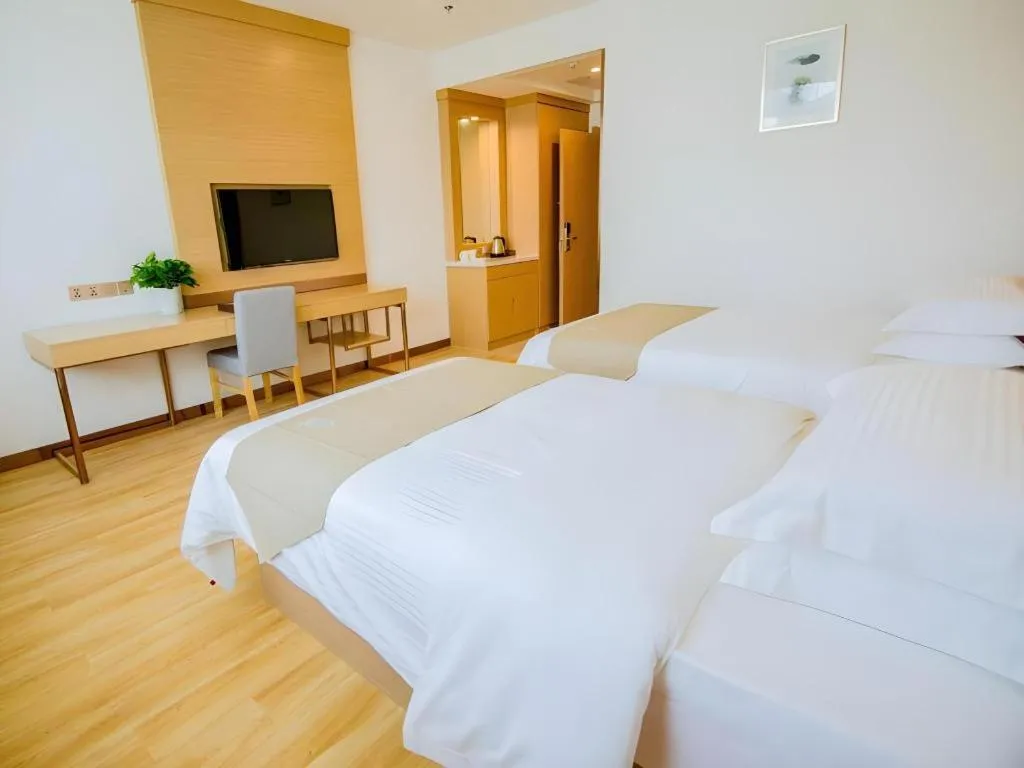 Bed in GreenTree Inn Nantong Zhangzhishan Town Deli Plaza Express Hotel