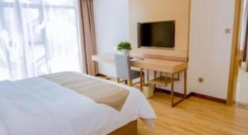 Bed in GreenTree Inn Nantong Zhangzhishan Town Deli Plaza Express Hotel