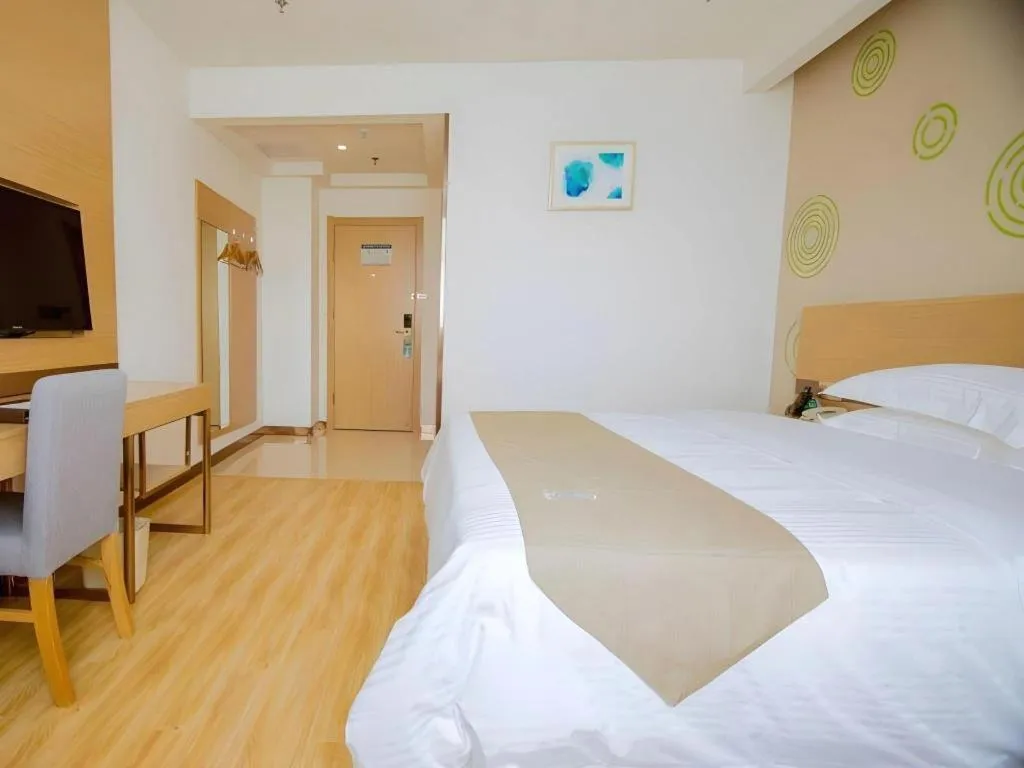 Bed in GreenTree Inn Nantong Zhangzhishan Town Deli Plaza Express Hotel