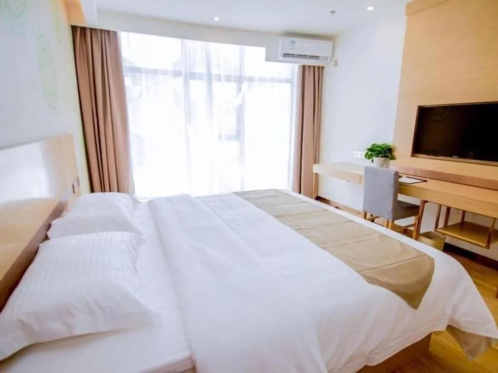Bed in GreenTree Inn Nantong Zhangzhishan Town Deli Plaza Express Hotel