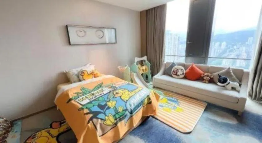 Bed in LONGYAN JINGHUA FLIPORT HOTEL