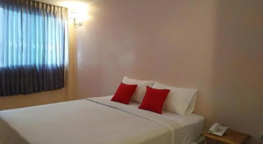 Bed in BIRD ROOM HOTEL - PRATUNAM