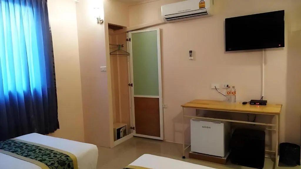 Bed in BIRD ROOM HOTEL - PRATUNAM