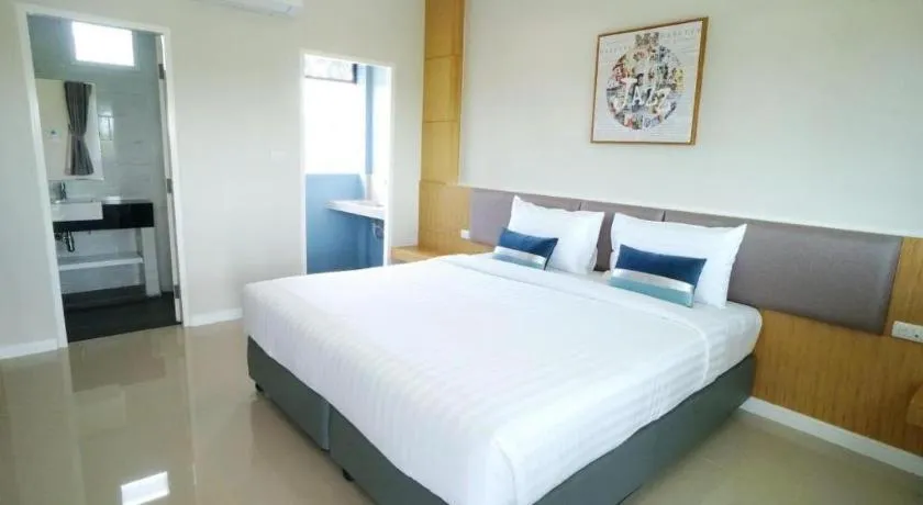 Bed in APA-TREE Boutique Hotel