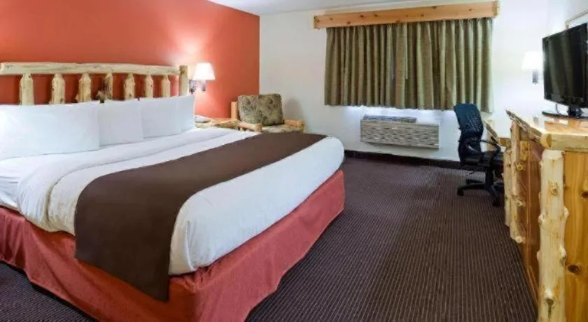 Bed in AmericInn by Wyndham Pequot Lakes