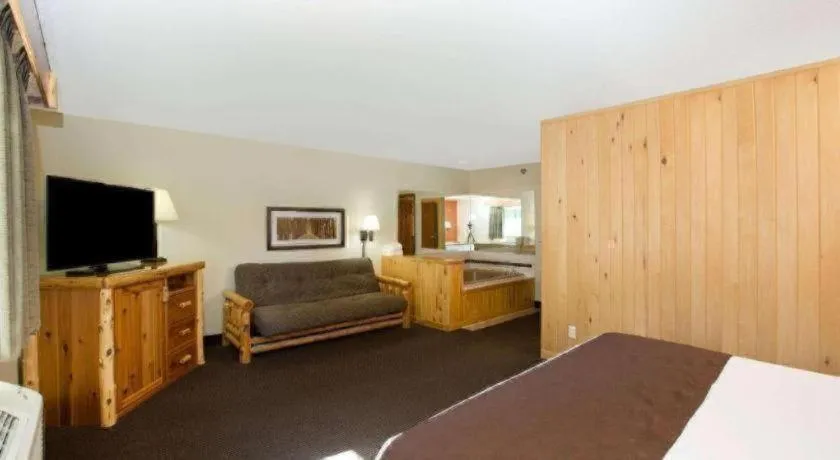 Bed in AmericInn by Wyndham Pequot Lakes