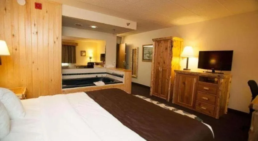 Bed in AmericInn by Wyndham Pequot Lakes