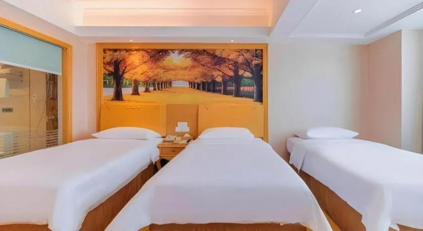 Bed in Vienna Hotel Guangdong Qingyuan Wanda Plaza Xincheng Beijiang