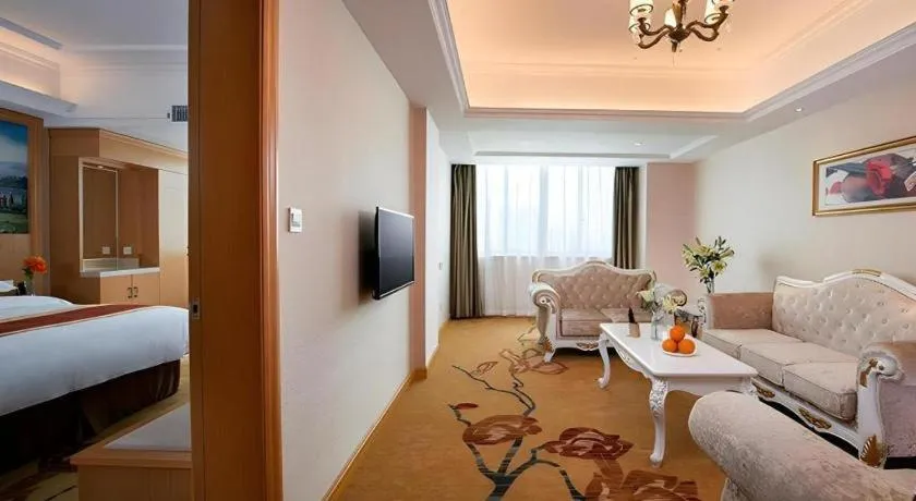 Bed in Vienna Hotel Guangdong Qingyuan Wanda Plaza Xincheng Beijiang