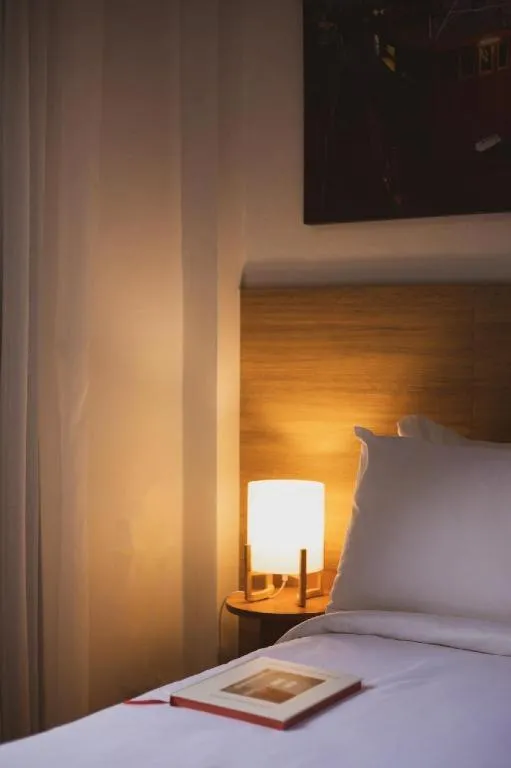 Bed in Sirichai Design Hotel