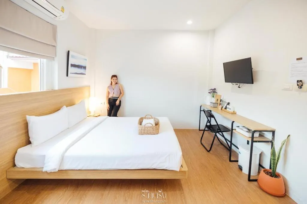 Bed in Sirichai Design Hotel