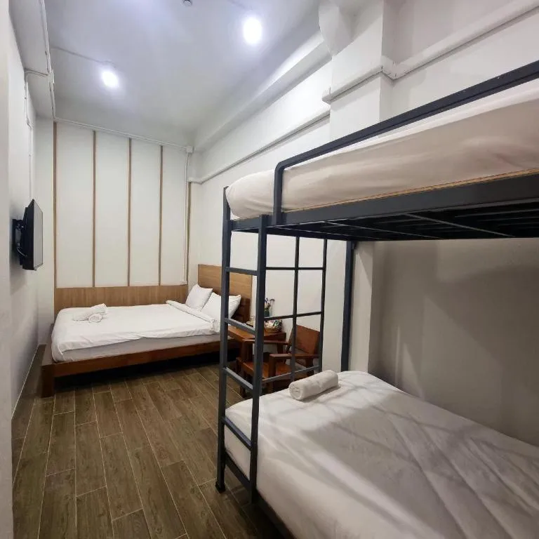 Bed in Sirichai Design Hotel