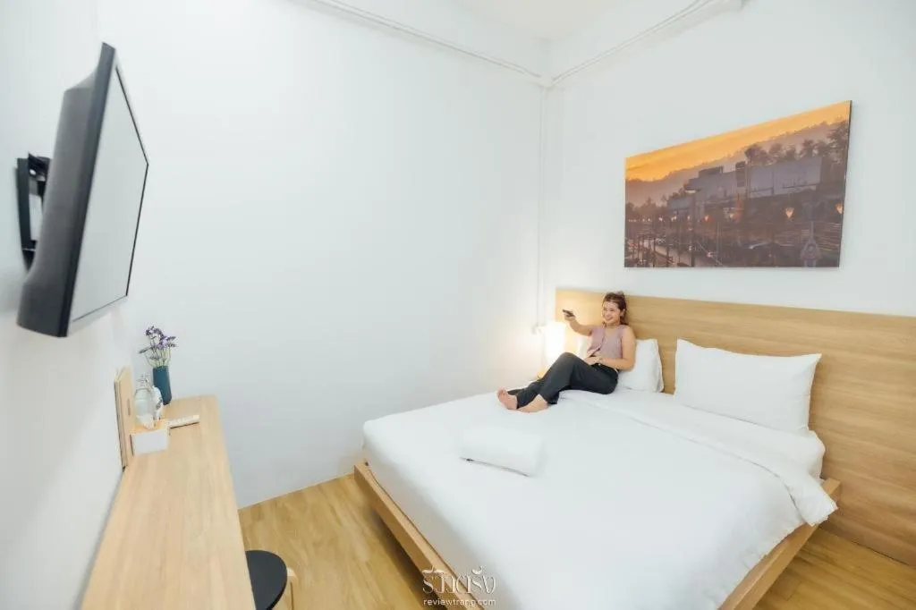 Bed in Sirichai Design Hotel