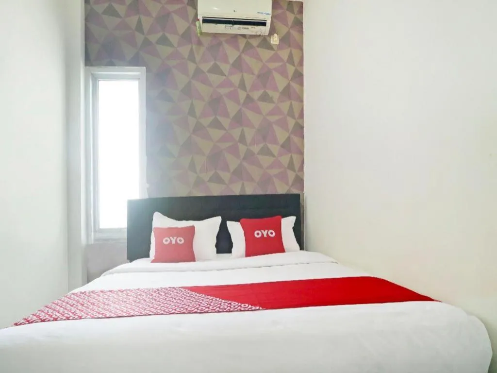 Bed in Hotel O Papi Inn Guesthouse