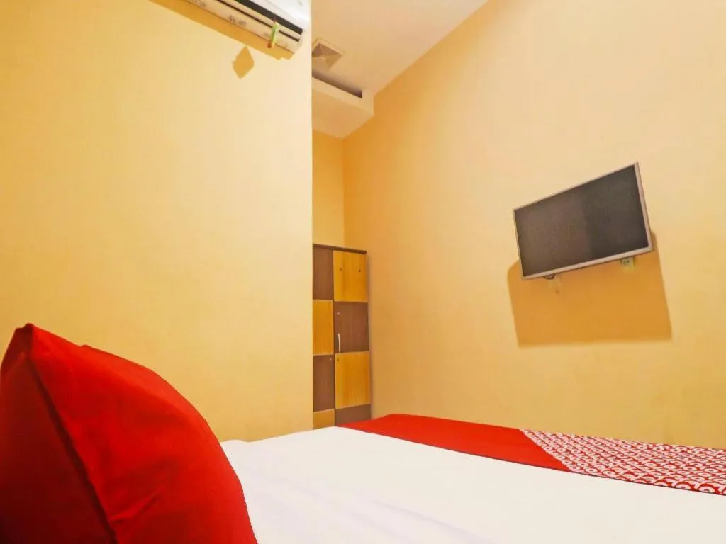 Bed in Hotel O Papi Inn Guesthouse