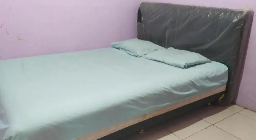 Bed in Hotel O Papi Inn Guesthouse