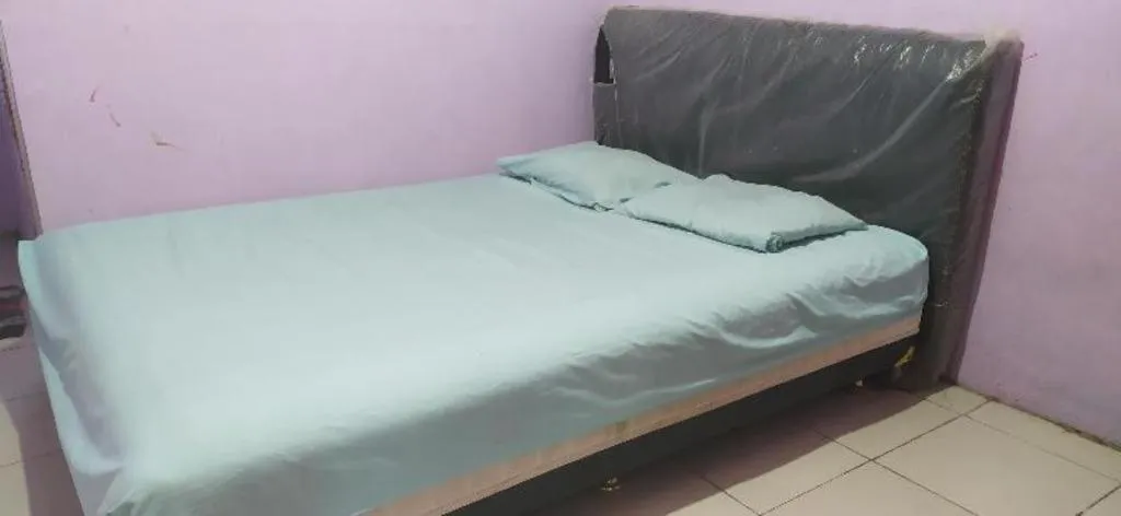 Bed in Hotel O Papi Inn Guesthouse