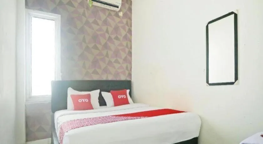 Bed in Hotel O Papi Inn Guesthouse