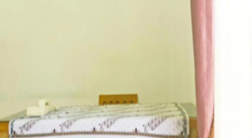 Bed in Hotel O Papi Inn Guesthouse