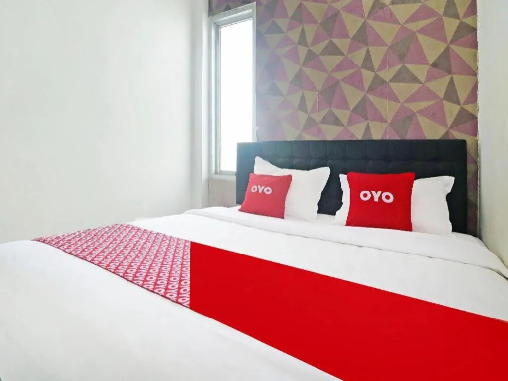 Bed in Hotel O Papi Inn Guesthouse