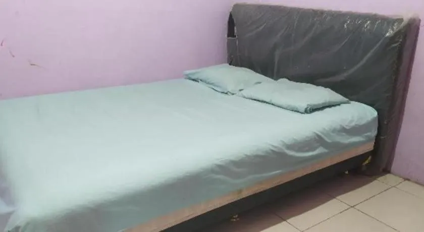 Bed in Hotel O Papi Inn Guesthouse