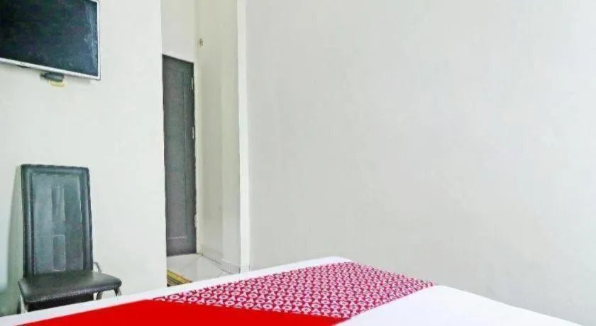 Bed in Hotel O Papi Inn Guesthouse