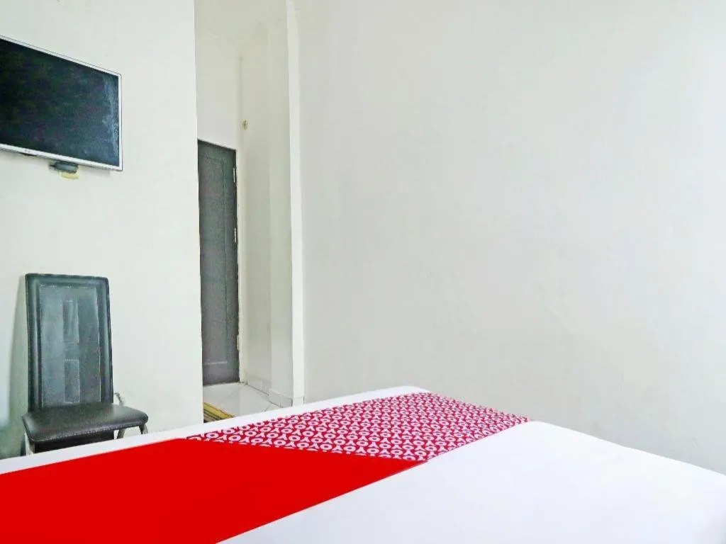 Bed in Hotel O Papi Inn Guesthouse