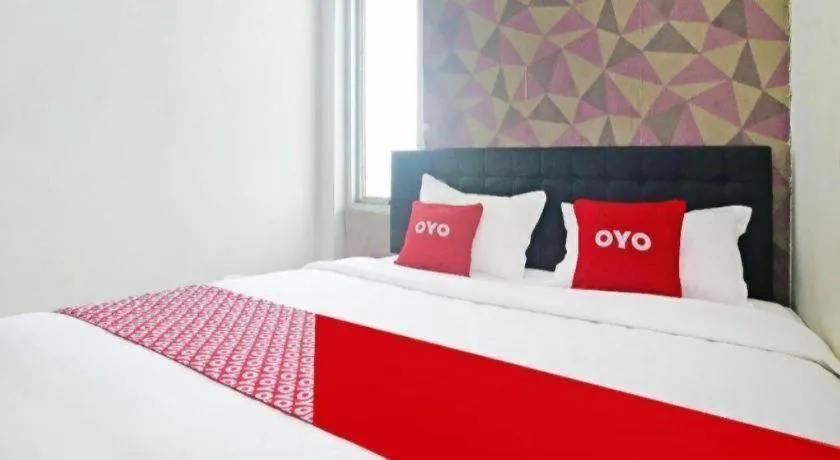 Bed in Hotel O Papi Inn Guesthouse