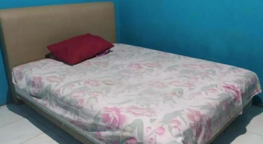 Bed in Hotel O Papi Inn Guesthouse