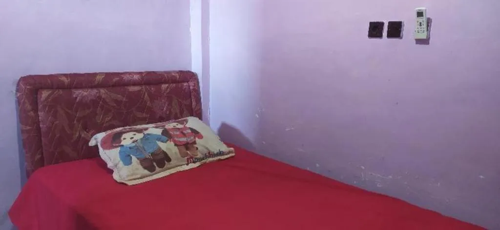 Bed in Hotel O Papi Inn Guesthouse