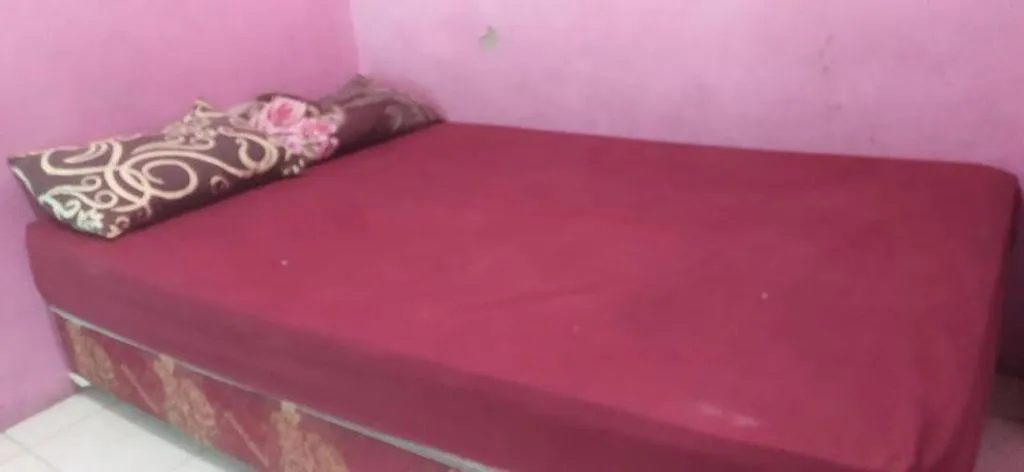 Bed in Hotel O Papi Inn Guesthouse