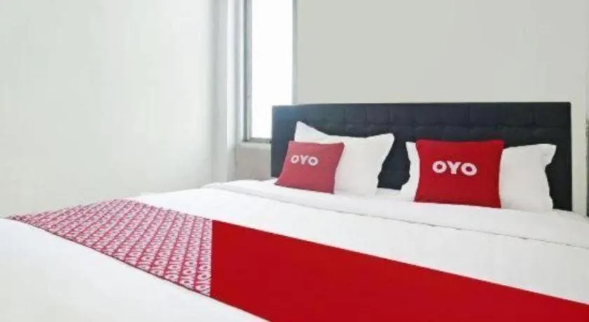 Bed in Hotel O Papi Inn Guesthouse