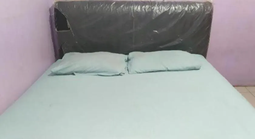 Bed in Hotel O Papi Inn Guesthouse