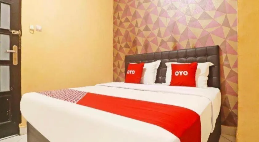 Bed in Hotel O Papi Inn Guesthouse