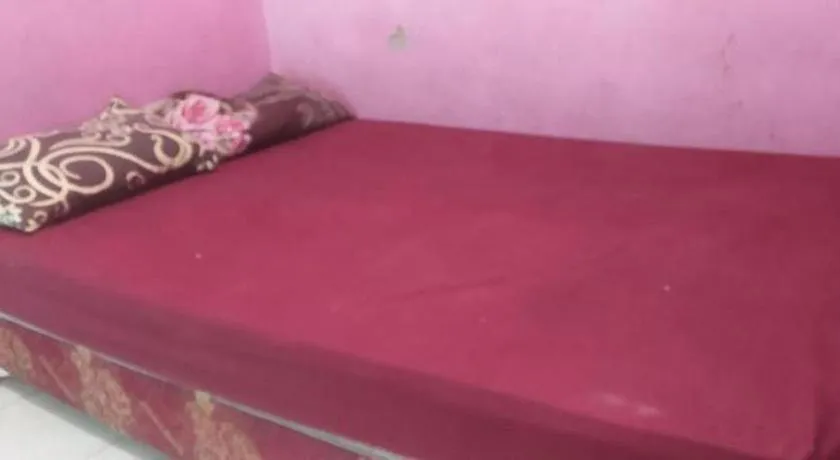 Bed in Hotel O Papi Inn Guesthouse