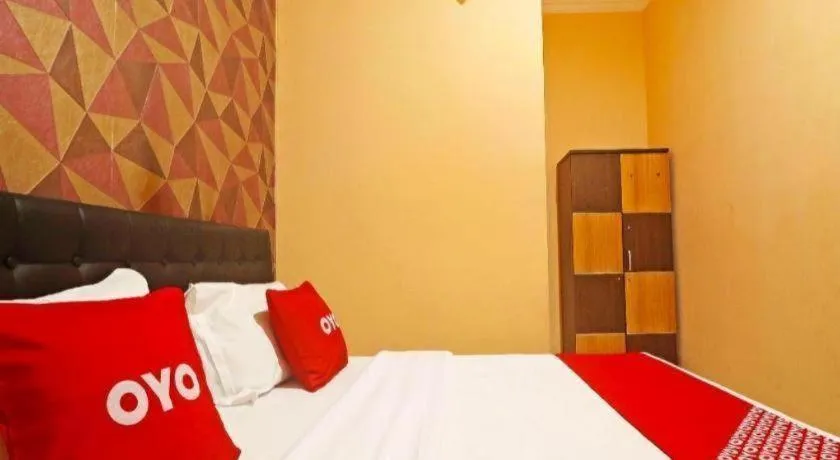 Bed in Hotel O Papi Inn Guesthouse