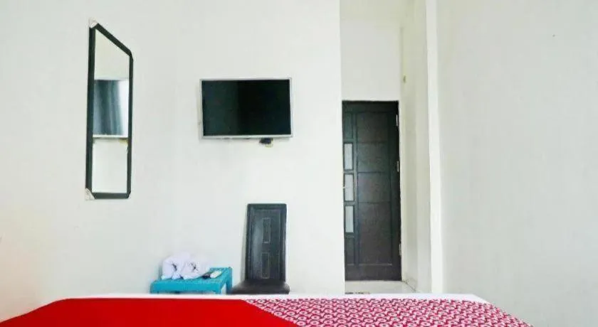 Bed in Hotel O Papi Inn Guesthouse