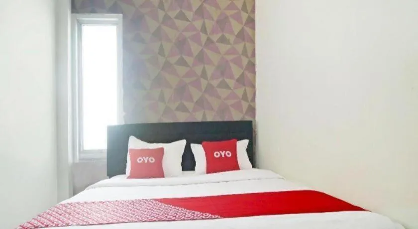 Bed in Hotel O Papi Inn Guesthouse