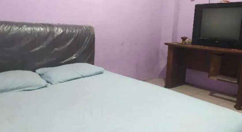 Bed in Hotel O Papi Inn Guesthouse