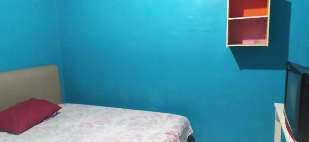 Bed in Hotel O Papi Inn Guesthouse