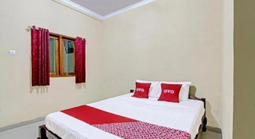 Bed in OYO 91353 Hotel Surya Andesa