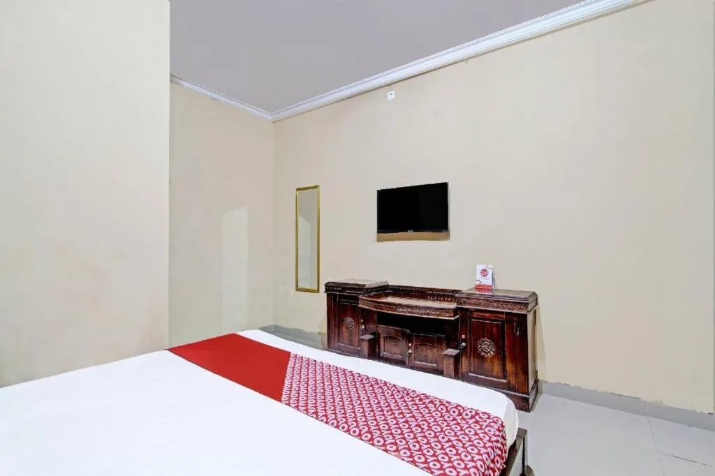 Bed in OYO 91353 Hotel Surya Andesa