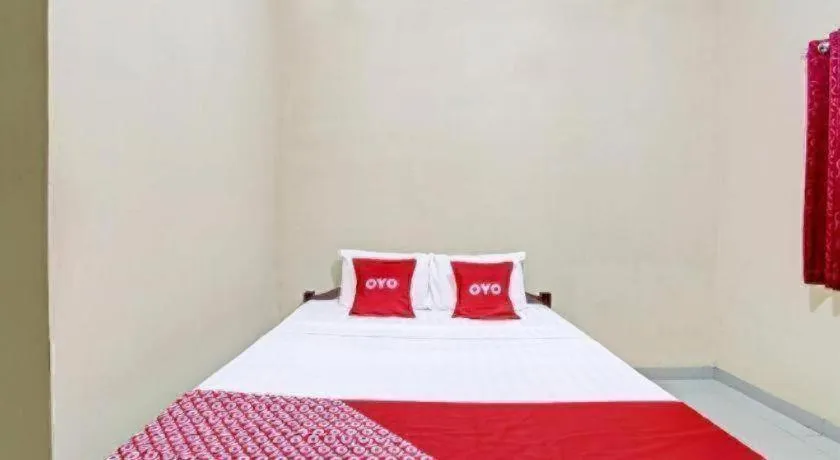 Bed in OYO 91353 Hotel Surya Andesa